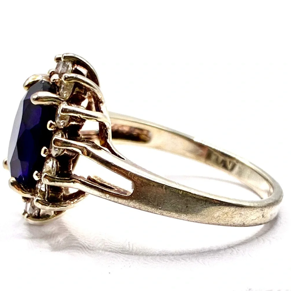 VTG Signed JC Oval Cut Cubic Zirconia Sapphire with Halo of CZ’s In Silver Tone